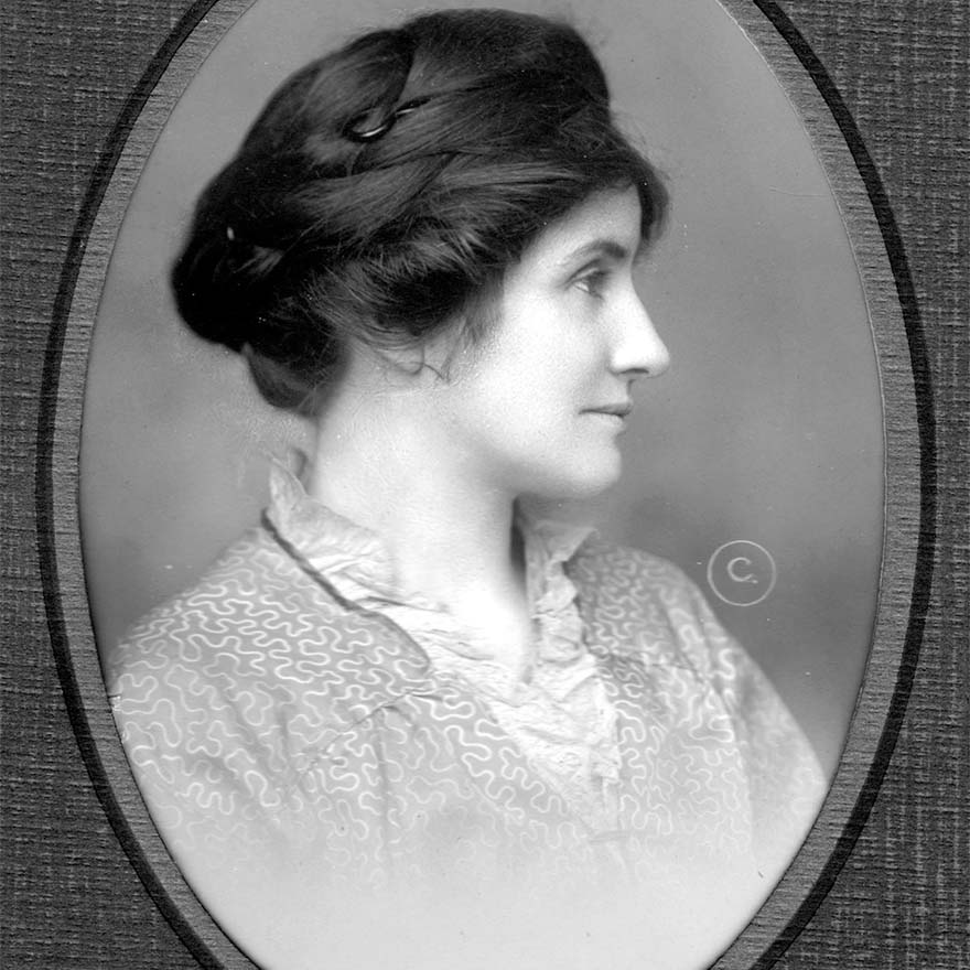 A black and white side profile photo of a woman